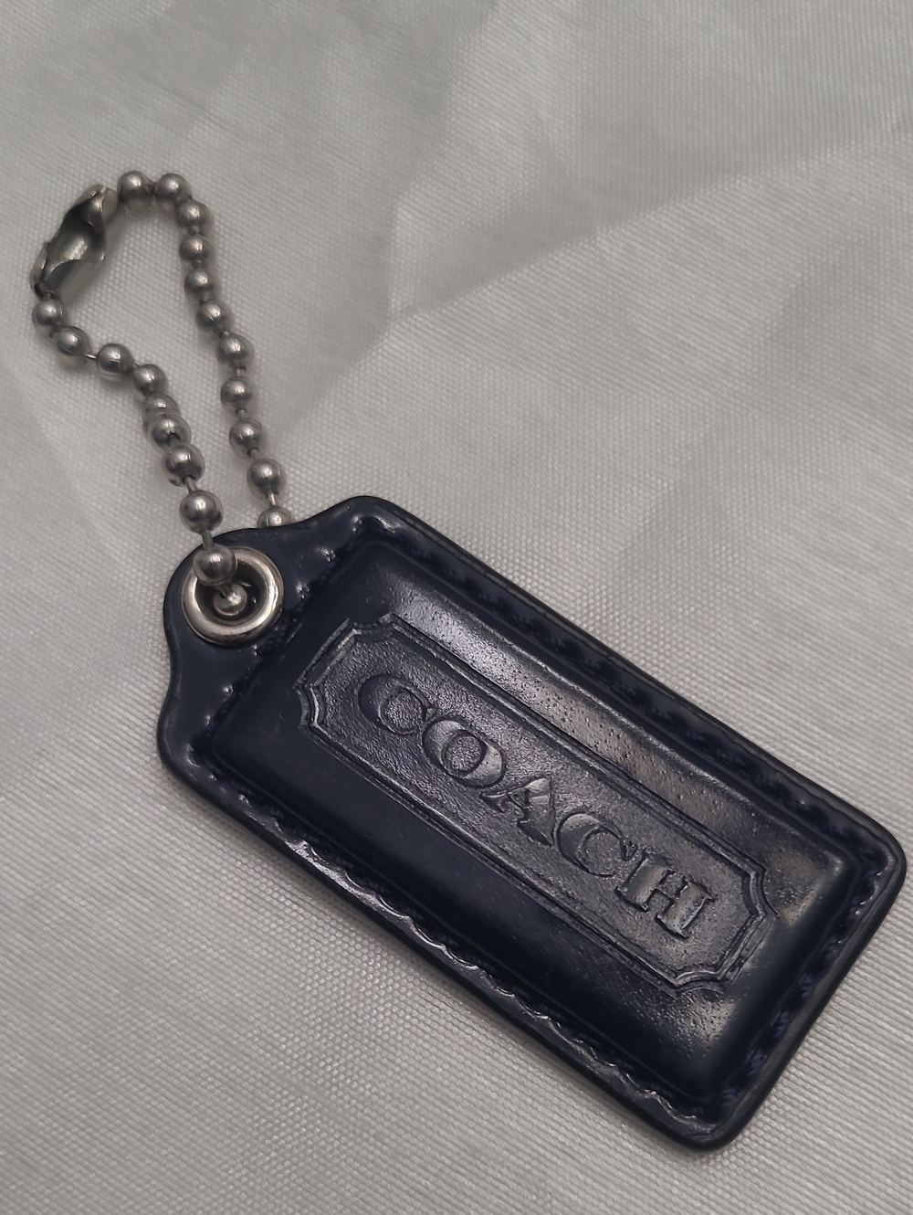 COACH Navy Hang Tag with Metal Ball Chain